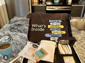 A Travel Sauce kit opened on the counter